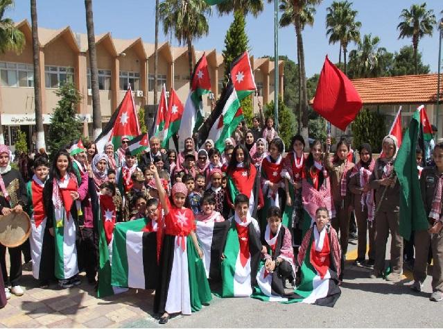 اليرموك تحتفل باليوم الوطني للعلم الأردني